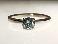 blue cultured diamond alternative engagement ring