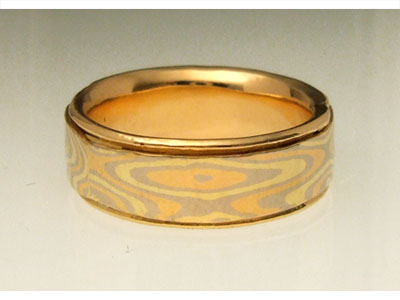 Yellow, White, and Red Gold Mokume Gane Wedding Ring with Gold Liner