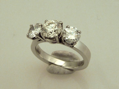 platinum three diamond engagement ring